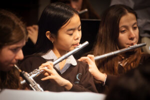students playing flutes